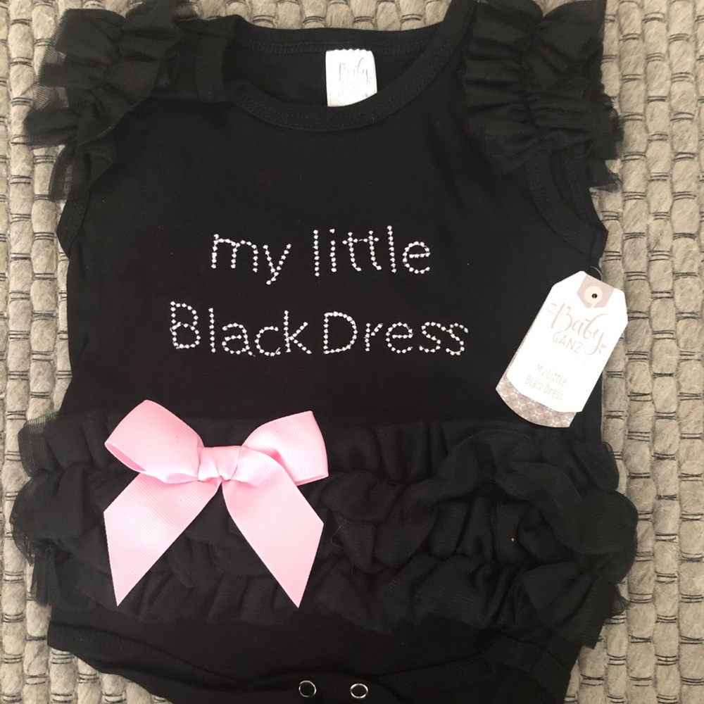 New with tags “my little black dress” onesie. 12m